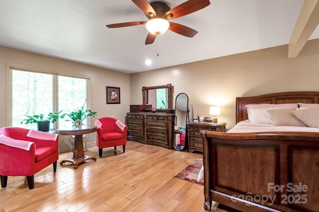 97 Ballantree Dr, Asheville, NC 28803 - bedroom with multiple windows, light wood-style flooring, and ceiling fan