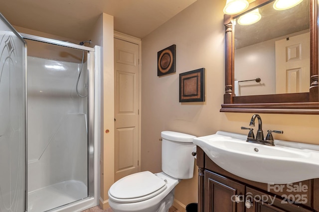 97 Ballantree Dr, Asheville, NC 28803 - bathroom with a shower stall, vanity, and toilet