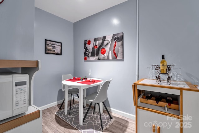 97 Ballantree Dr, Asheville, NC 28803 - dining space with wood finished floors and baseboards