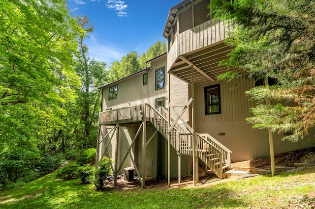 97 Ballantree Dr, Asheville, NC 28803 - rear view of property featuring stairway, a yard, and central AC