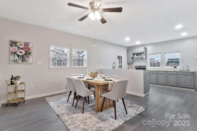 dining space featuring dark wood-style floors, recessed lighting, baseboards, and a ceiling fan