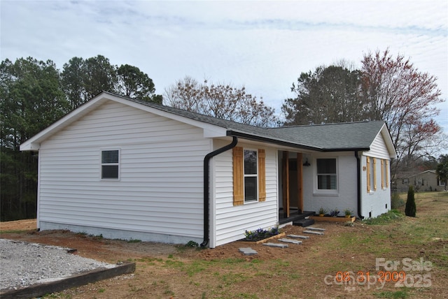 view of front of house with brick siding