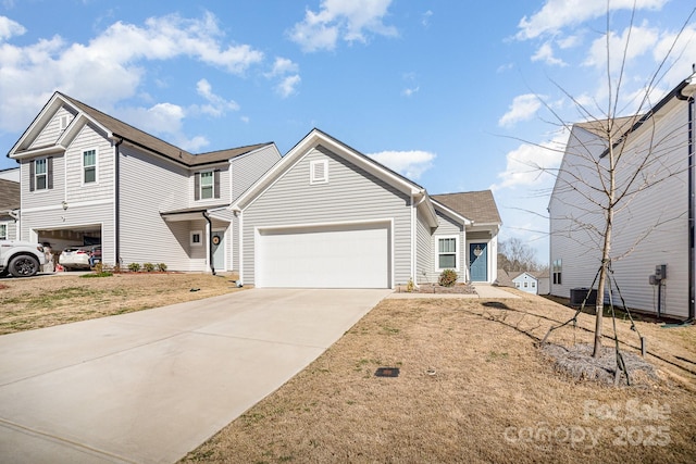 traditional-style house with an attached garage and driveway