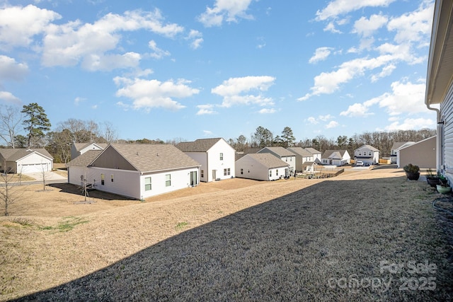 view of yard with a residential view