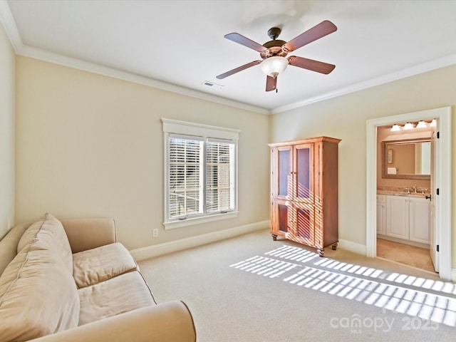 living area featuring visible vents, baseboards, light colored carpet, and crown molding