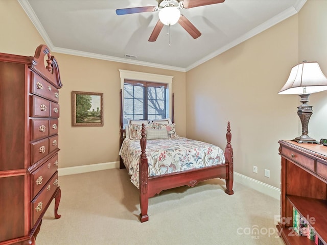 bedroom with visible vents, baseboards, light colored carpet, and ornamental molding