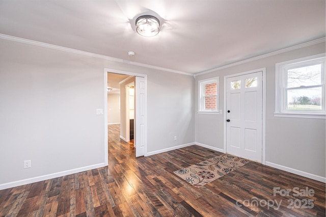 foyer featuring dark wood-style floors, baseboards, and ornamental molding