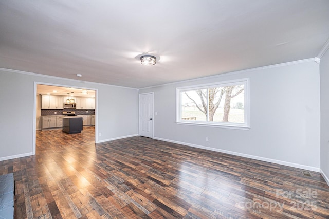 unfurnished living room featuring ornamental molding, baseboards, and dark wood-style flooring