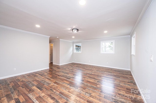 empty room with recessed lighting, ornamental molding, baseboards, and dark wood-style flooring