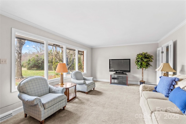 living room with crown molding, baseboards, visible vents, and light carpet