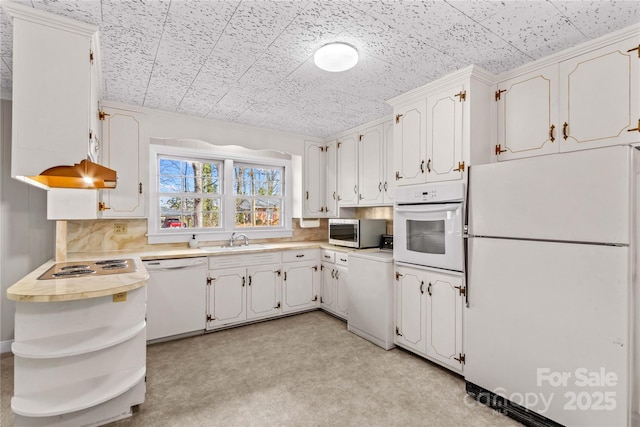 kitchen with white appliances, open shelves, light countertops, white cabinets, and tasteful backsplash