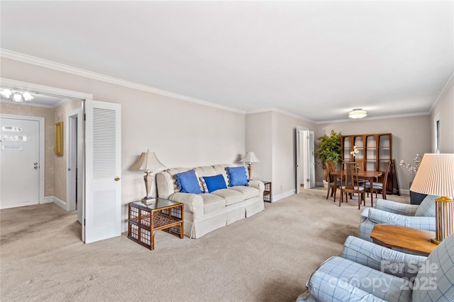 living room with baseboards, light carpet, and ornamental molding