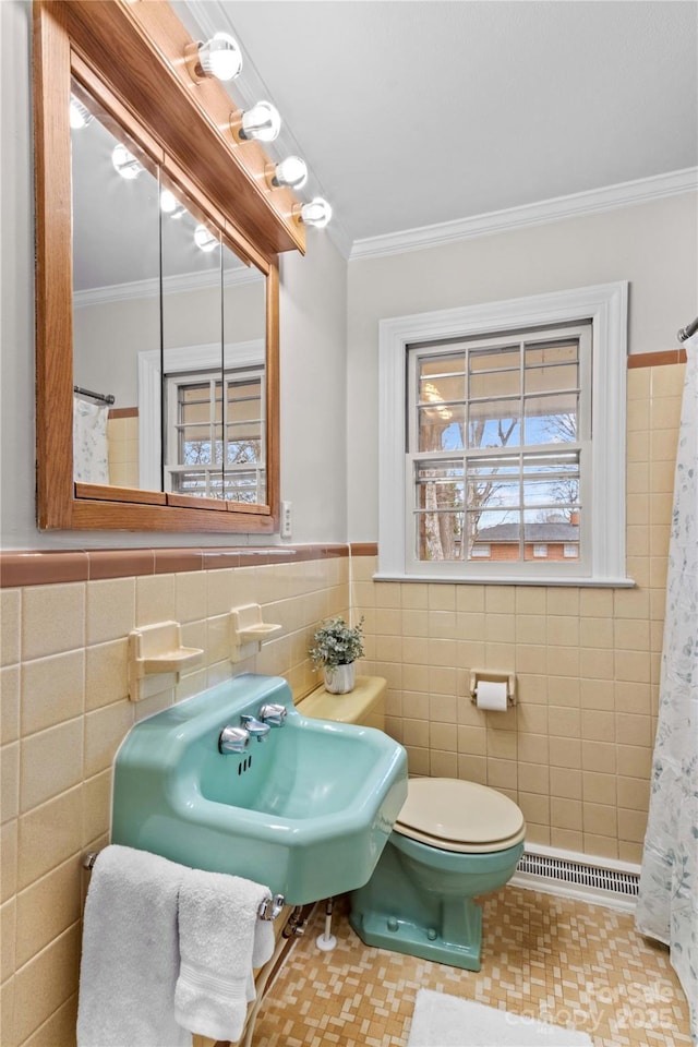 full bath featuring visible vents, toilet, tile walls, and ornamental molding