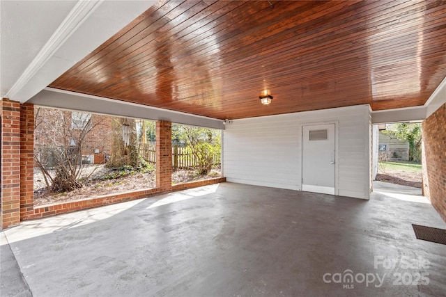 view of patio / terrace featuring fence