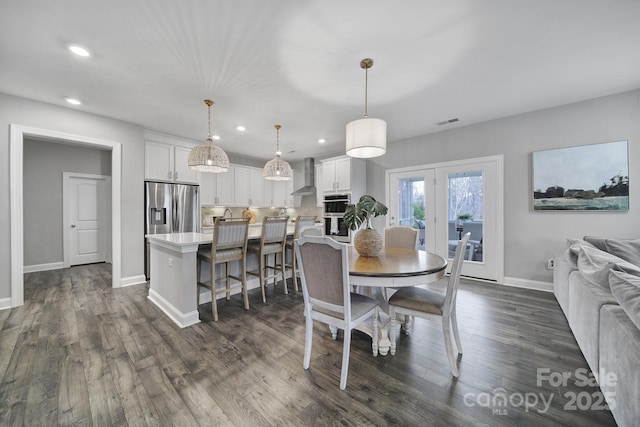 dining area with visible vents, baseboards, recessed lighting, french doors, and dark wood-style flooring