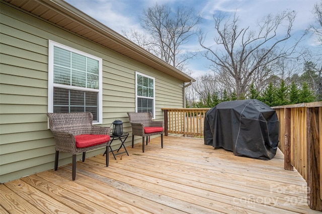 wooden terrace with grilling area