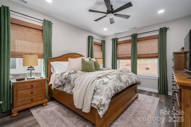 bedroom featuring visible vents, wood finished floors, recessed lighting, baseboards, and ceiling fan