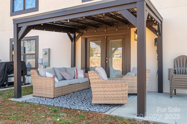 view of patio featuring grilling area, outdoor lounge area, and french doors