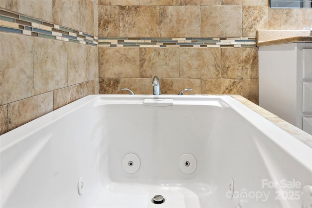 interior details with a whirlpool tub