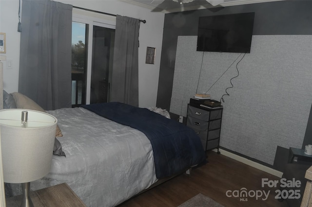 bedroom featuring wood finished floors