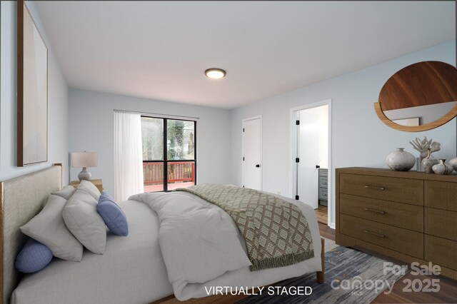 bedroom featuring wood finished floors