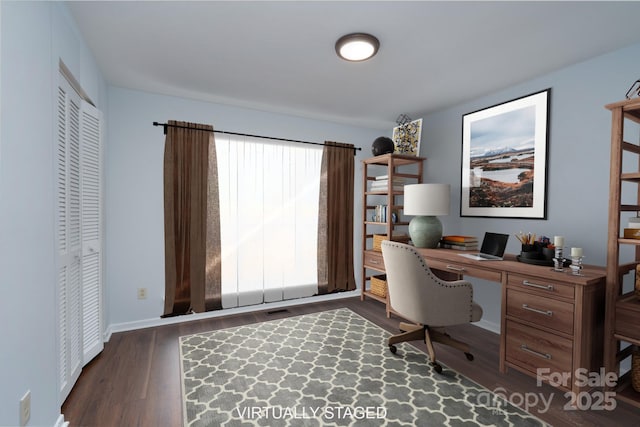 home office featuring visible vents, wood finished floors, and baseboards