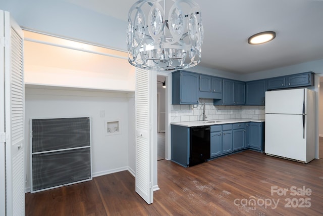 kitchen with blue cabinetry, dark wood-type flooring, light countertops, black dishwasher, and freestanding refrigerator