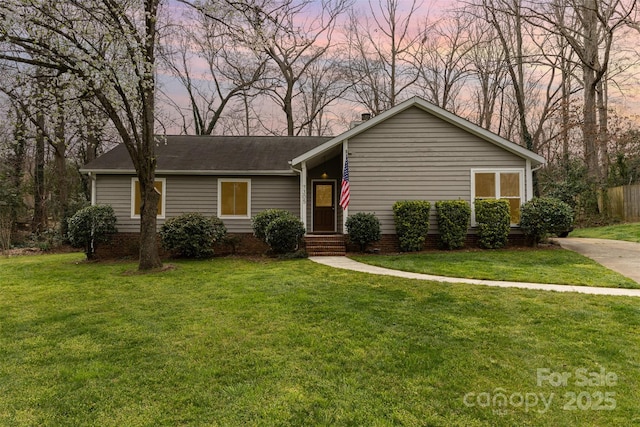 view of front of home featuring a front lawn