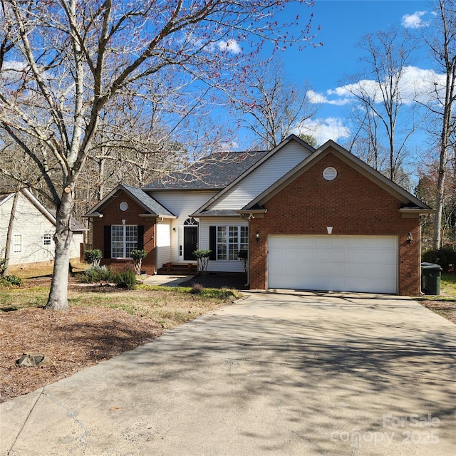 ranch-style home featuring a garage, brick siding, and concrete driveway