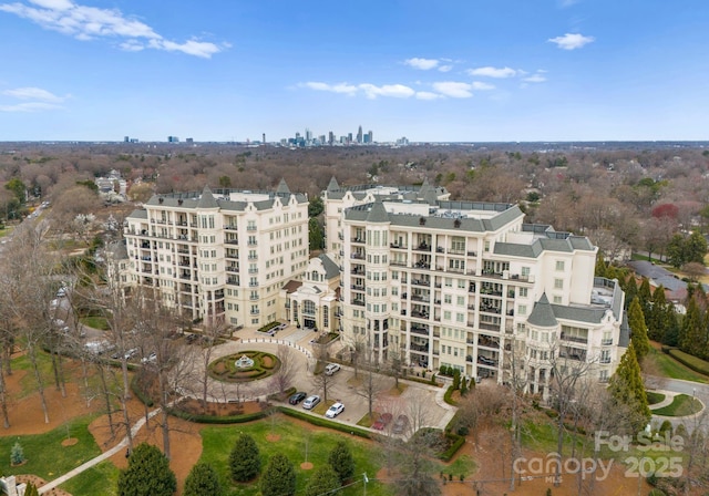 drone / aerial view featuring a city view