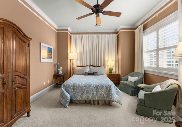 bedroom with visible vents, crown molding, baseboards, ceiling fan, and light colored carpet