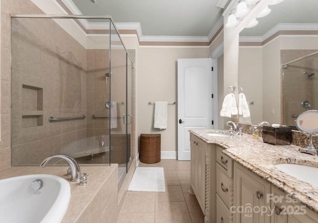 full bath featuring a sink, a shower stall, and ornamental molding