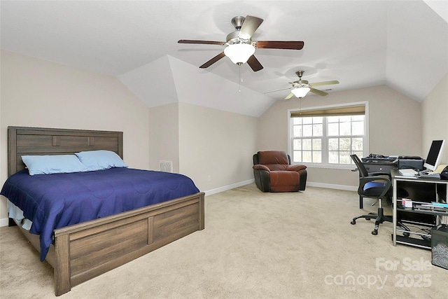 carpeted bedroom with ceiling fan, baseboards, and lofted ceiling