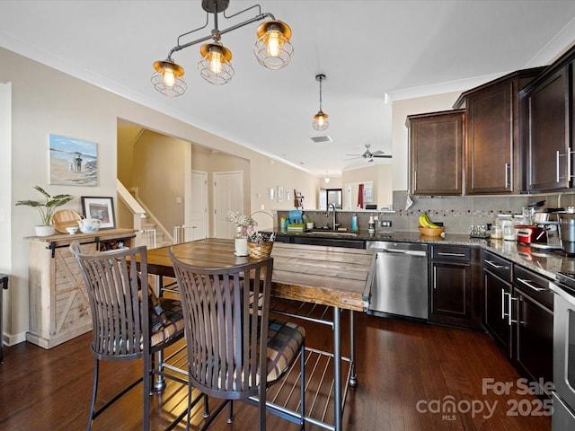 430 Battery Cir, Clover, SC 29710 - kitchen with dark brown cabinets, a ceiling fan, appliances with stainless steel finishes, and a sink