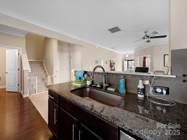 430 Battery Cir, Clover, SC 29710 - kitchen featuring visible vents, a sink, dark stone counters, ceiling fan, and dark wood-style flooring