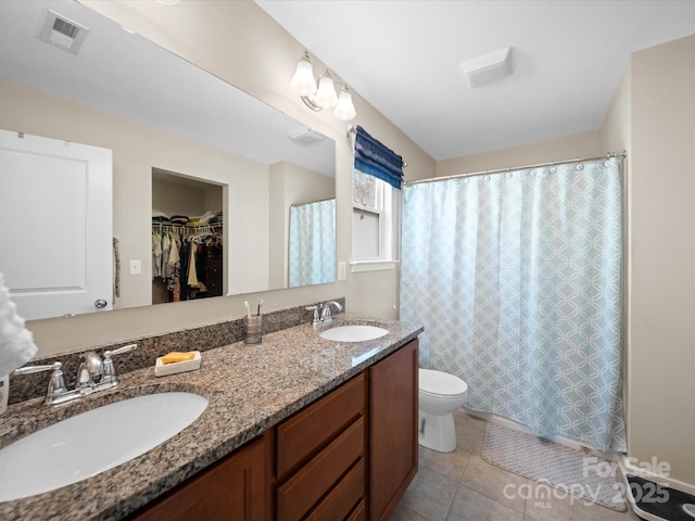 430 Battery Cir, Clover, SC 29710 - bathroom with tile patterned floors, toilet, visible vents, and a sink