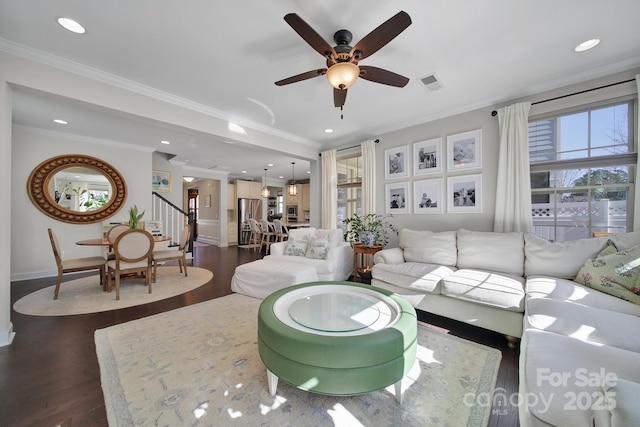 living area featuring visible vents, recessed lighting, stairway, crown molding, and dark wood-style flooring