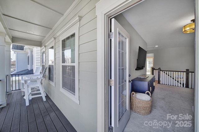 balcony featuring covered porch