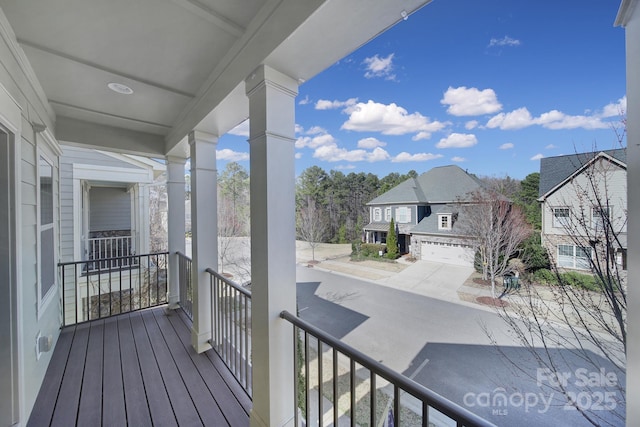 balcony featuring a residential view