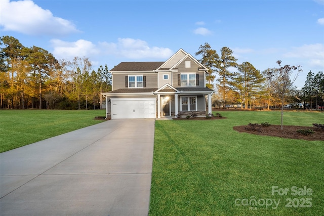 view of front of house featuring a garage, concrete driveway, and a front lawn