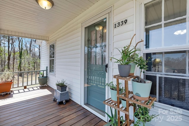 wooden deck with covered porch