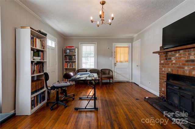 1414 S Post Rd, Shelby, NC 28152 - home office featuring an inviting chandelier, wood-type flooring, a textured ceiling, and crown molding
