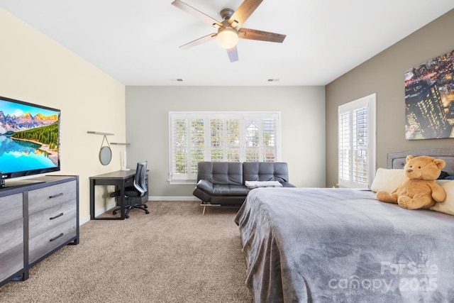 bedroom with baseboards, carpet, and a ceiling fan