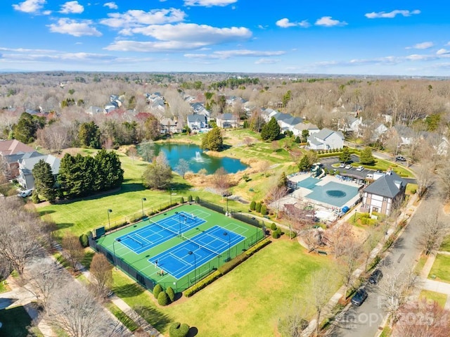 bird's eye view with a residential view and a water view