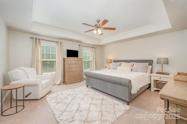9428 Segundo Ln, Charlotte, NC 28278 - bedroom with a tray ceiling, ceiling fan, light colored carpet, and ornamental molding
