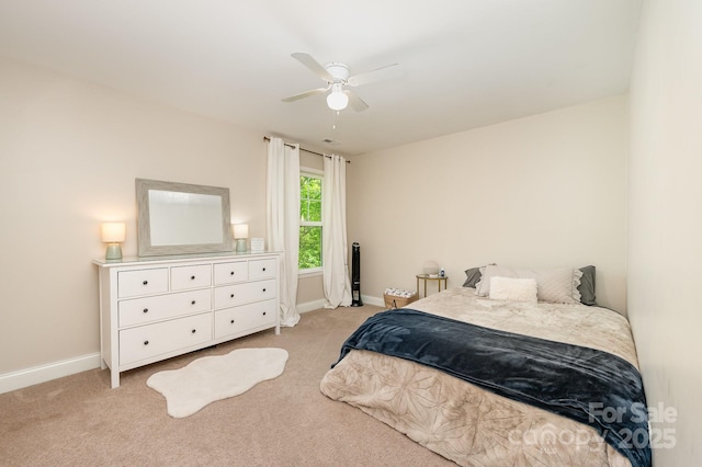 9428 Segundo Ln, Charlotte, NC 28278 - bedroom featuring light carpet, a ceiling fan, and baseboards