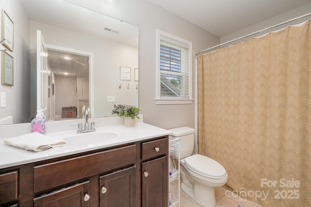 9428 Segundo Ln, Charlotte, NC 28278 - bathroom with tile patterned flooring, visible vents, toilet, vanity, and a shower with shower curtain