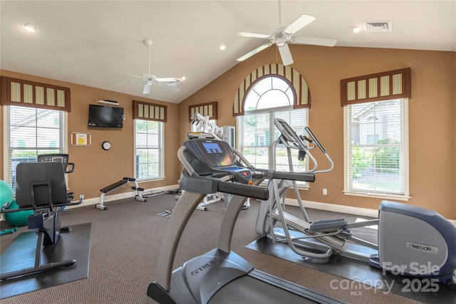 workout room featuring visible vents, baseboards, a ceiling fan, and vaulted ceiling