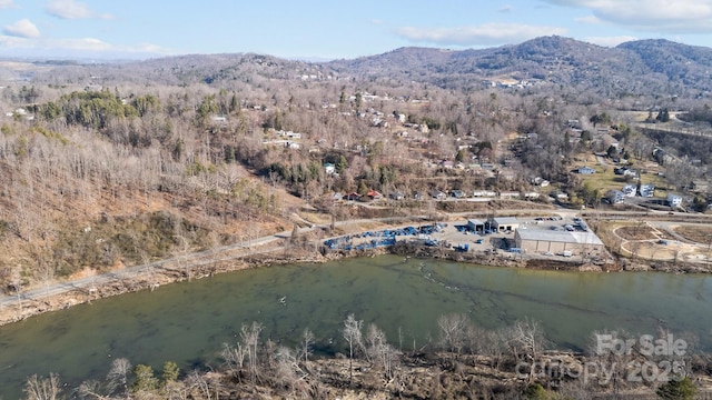 bird's eye view featuring a water and mountain view