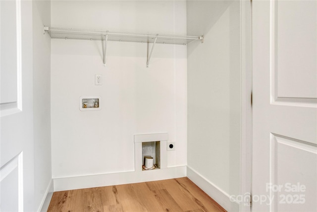 washroom with light wood finished floors, baseboards, laundry area, hookup for a washing machine, and electric dryer hookup